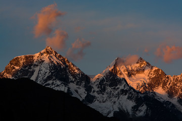 Snoy mountains during sunset
