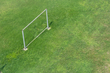 section of the fence on a green grass field