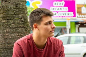 Cheerful young teenager strolling