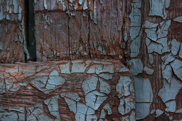 Cracking and peeling paint on a wall