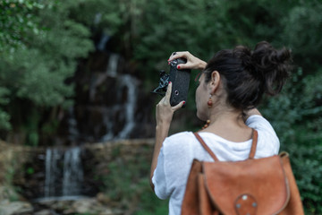 young and brunette girl of nature tourism