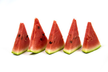 Close - up of several pieces of refreshing watermelon isolated on white background. Fruits vegetables. Useful product.