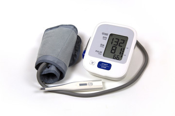Blood pressure tonometer with electronic thermometer isolated on white background. Medicine health technology.