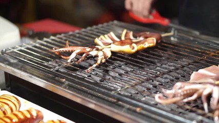 Street food grill squid at local market