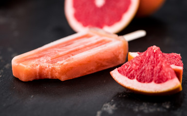 Homemade Grapefruit Popsicles (selective focus)