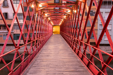The Eiffel Bridge on the Onyar River at dusk in Girona, Catalonia (Spain) © Jorge Fuentes