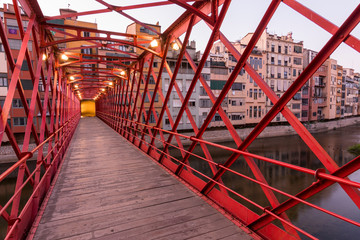 The Eiffel Bridge on the Onyar River at dusk in Girona, Catalonia (Spain) © Jorge Fuentes