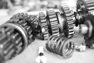 Gears of motorcycle engine. / Selective focus. / black and white.