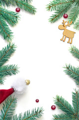 Fototapeta na wymiar Fir branch and deer on white background with copy space for text. Christmas