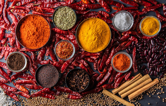 Variety of spices and herbs on kitchen table