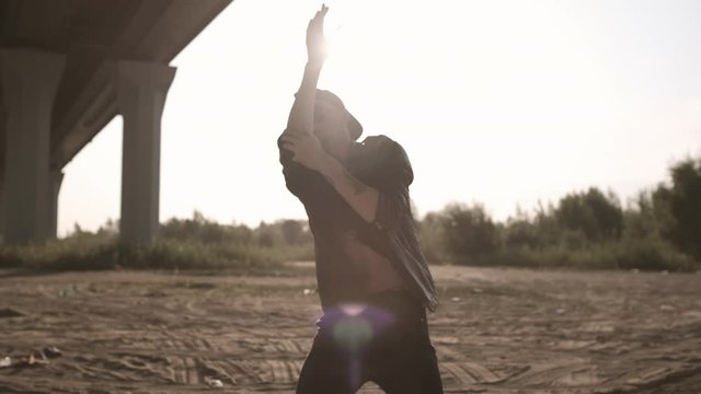 Talented Young Man Performing Cool Dance. Bad Guy. Stylish Man In Glasses Emotionally Dancing. Caucasian Man Dancing Outdoors. Contemporary Dance. Krump. Hip Hop Style. Active Lifestyle. Sunny Day 4K