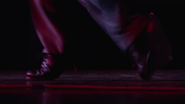 Male flamenco dancer tapping the floor close-up