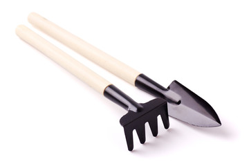 Mini rake and spade for pots gardening. isolated on white background