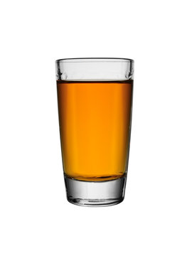 shot glass of whiskey on white background