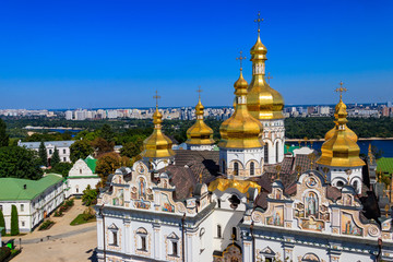 View of Dormition Cathedral of the Kyiv Pechersk Lavra (Kiev Monastery of the Caves) and the Dnieper river in Ukraine. View from Great Lavra Bell Tower