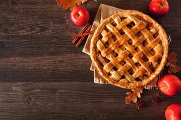 Fleecedeken met foto Homemade autumn apple pie corner border. Above view table scene over a dark wood background with copy space. © Jenifoto