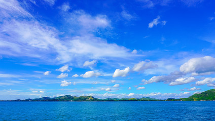 Plakat landscape of sea and island and beautiful cloudy during the sunny day.
