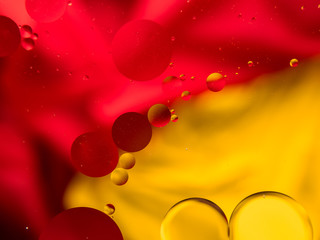 Colourful surreal psychedelic abstract liquid background. Water and oil drops with small air bubbles
