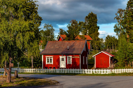 View of small, red Swedish houses in the swedish village Herräng, near by the east coast northern Stockholm