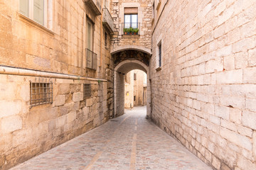 Obraz premium Historic center and Jewish quarter of Girona (Spain), one of the best preserved neighborhoods in Spain and Europe.