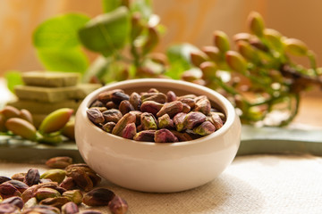 Sweet, delicate and fragrant nuts, Bronte pistachios with  brilliant green colour, ingredient for Italian cuisine, ice creams, cakes, pesto