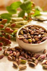 Sweet, delicate and fragrant nuts, Bronte pistachios with  brilliant green colour, ingredient for Italian cuisine, ice creams, cakes, pesto