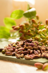 Sweet, delicate and fragrant nuts, Bronte pistachios with  brilliant green colour, ingredient for Italian cuisine, ice creams, cakes, pesto