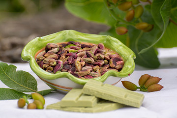 Sweet, delicate, fragrant nuts, Bronte pistachios with  brilliant green colour and handmade pistachio chocolate