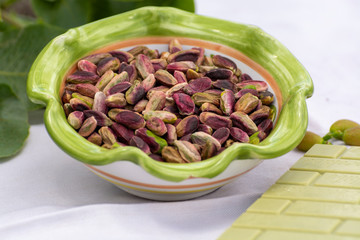 Sweet, delicate, fragrant nuts, Bronte pistachios with  brilliant green colour and handmade pistachio chocolate