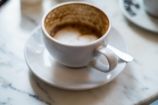 Empty cup of cappuccino.