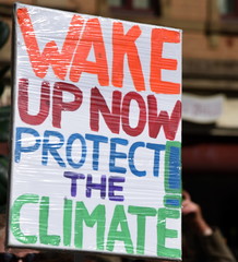 Transparent: "Wake up now protect the Climate"