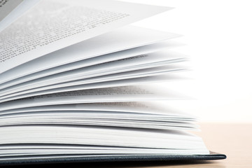 open book and many pages and text