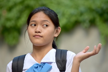 Cute Filipina Girl Student And Indecisiveness - obrazy, fototapety, plakaty