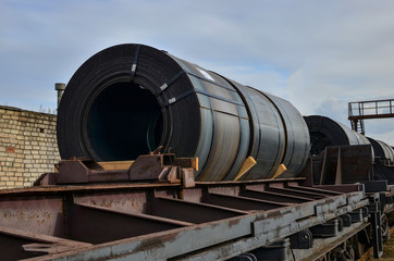 Trainload of rolled steel coil