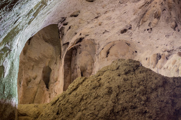 Impressive, alien shapes inside the massive cave of Vladikine ploce on Old mountain in Serbia and a light hitting the walls from outside