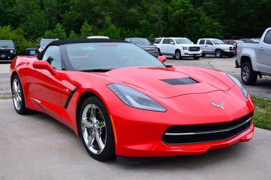WILMINGTON, ILLINOIS, USA - JULY 16: Red american sportscar Chevrolet Corvette in the city street in Wilmington on July 16, 2017.