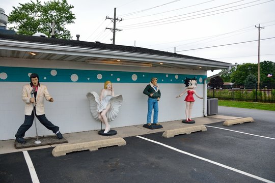 BRAIDWOOD, IL/USA - JULY 16: Statues of Elvis Presley, Marilyn Monroe, James Dean, and Betty Boop at the Polk-a-Dot (polka dot) Drive In on Route 66, on July 16, 2017, in Braidwood, Illinois.