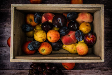 fruit crate box with and assortment of fresh crops 