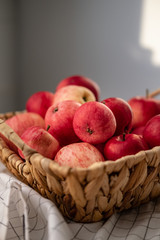 Ripe red apples in a wicker box. Top view with space for your text.