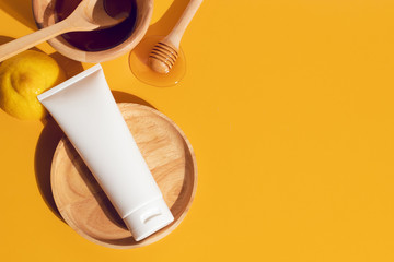 beauty spa medical skincare and cosmetic lotion bottle cream packaging product on white decor background and lemon fruit honey extract concept