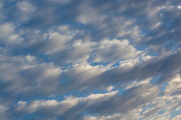 The sun's rays pass through the clouds.Very beautiful sunset. Dramatic sky.Beautiful landscape. The blue, lilac sky. Beautiful landscape. Background.