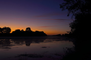 Fototapeta na wymiar Colourful Sunrise over River
