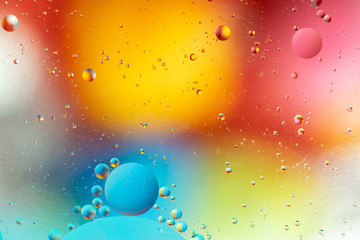 Abstract background, colorful gradient colors. Oil drops in water.