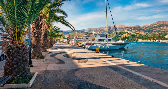 Picturesque spring cityscape of Argostoli port. Colorful morning scene of Kefalonia island, Greece, Europe. Beautiful seascape of Ionian Sea. Traveling concept background.