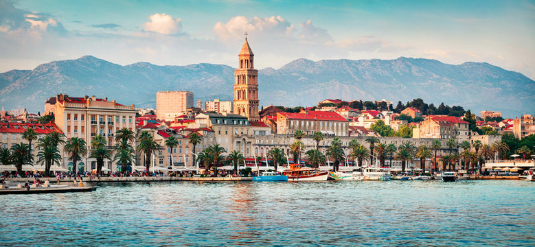 Colorful evening panorama of Split city with Diocletian palace. Splendid summer seascape of Adriatic sea, Croatia, Europe. Beautiful world of Mediterranean countries. Traveling concept background.