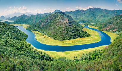 Aerial view of Canyon of Rijeka Crnojevica river, Skadar lake lacation. Colorful summer scene of Montenegro countryside. Beautiful world of Mediterranean countries. Traveling concept background.