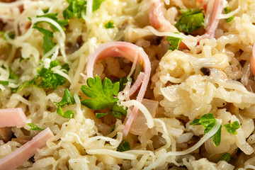 Risotto with mushrooms, ham and cheese