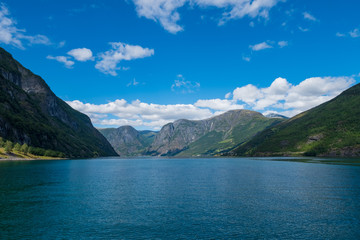 Fototapeta na wymiar Flom(Flam) and Aurlandsfjord - unesco enlisted natural heritage site - in Norway. July 2019