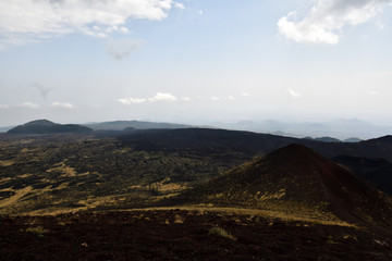 Naklejka na ściany i meble Volcanic landscape: a view from Etna