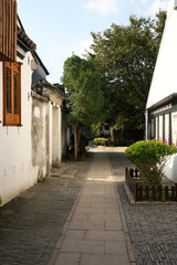 Zhouzhuang,China-September 17, 2019: An alley and a canal in water township of Zhouzhuang, Suzhou, China